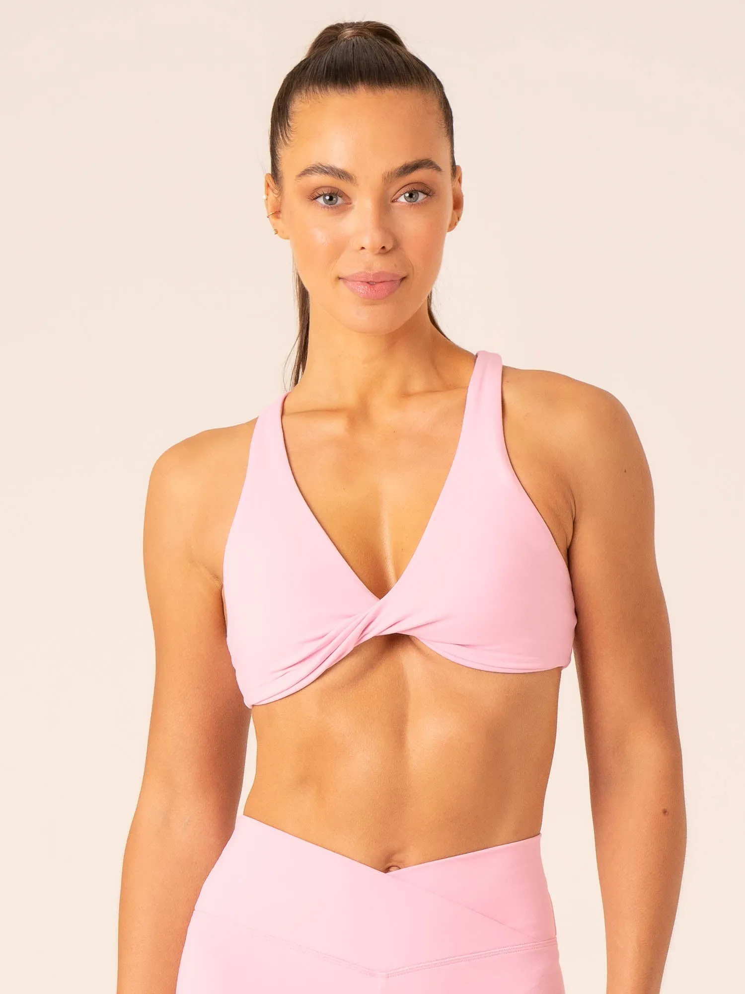 Momentum Twist Sports Bra - Candy Pink