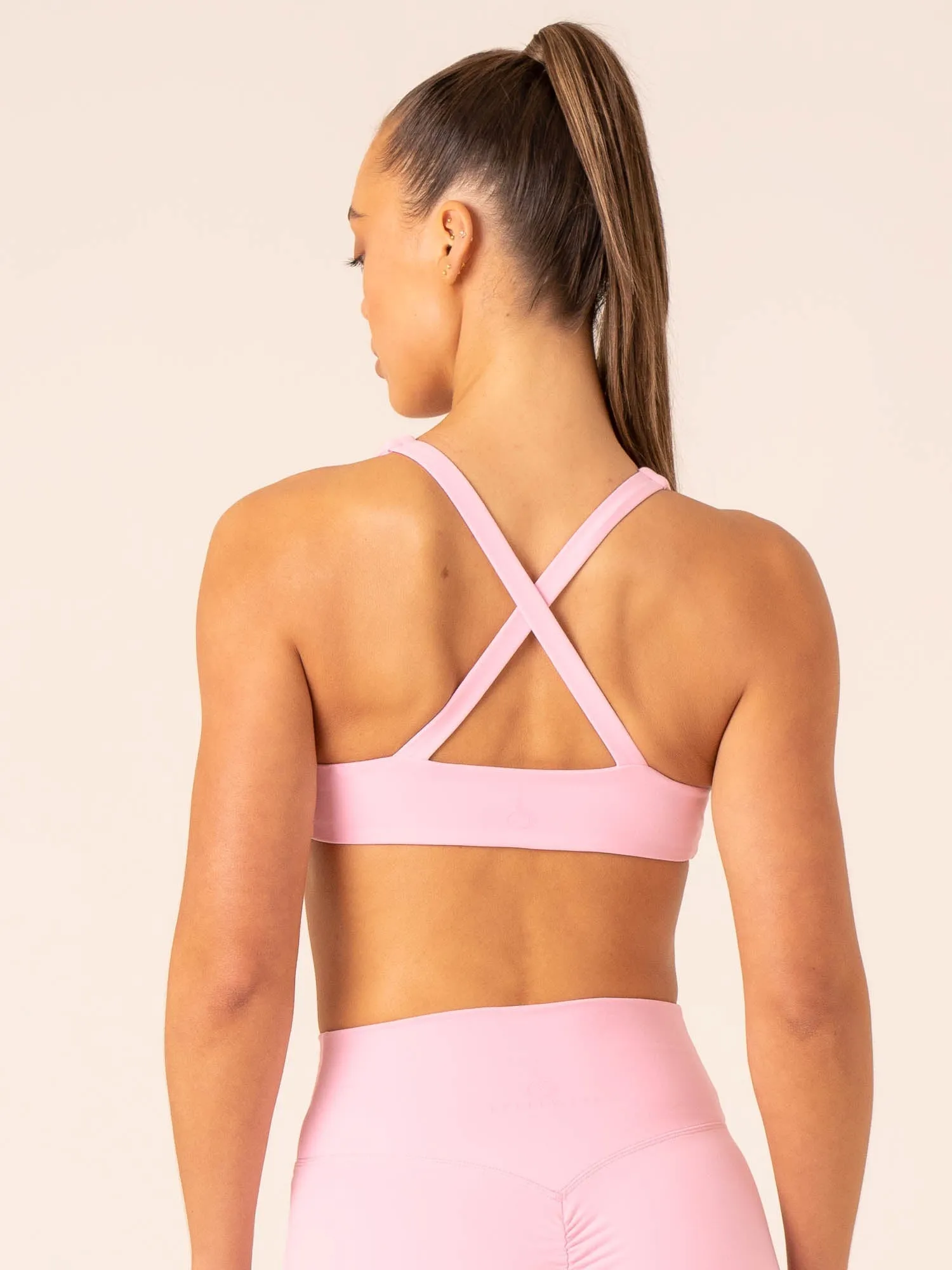 Momentum Twist Sports Bra - Candy Pink